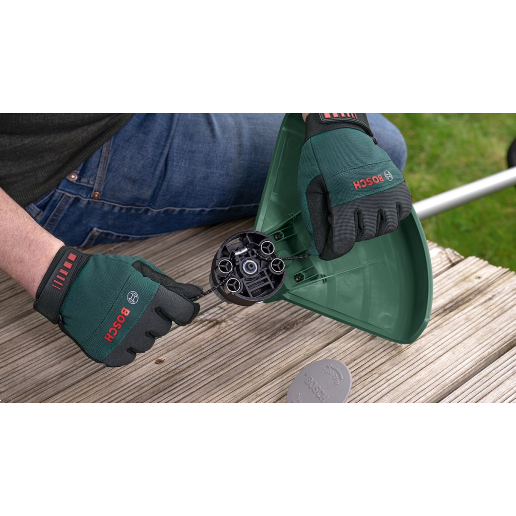 Тример садовий Bosch AFS 23-37 1000Вт, ліска 37см, ніж 23см, 5.7кг (0.600.8A9.000) - фото 11 Тример садовий Bosch AFS 23-37 1000Вт, ліска 37см, ніж 23см, 5.7кг (0.600.8A9.000) - фото 11