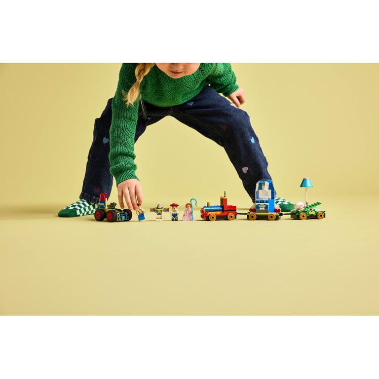 Конструктор LEGO Disney та Pixar Святкування з Історії іграшок: поїзд та авто для гонок (43264) - фото 9